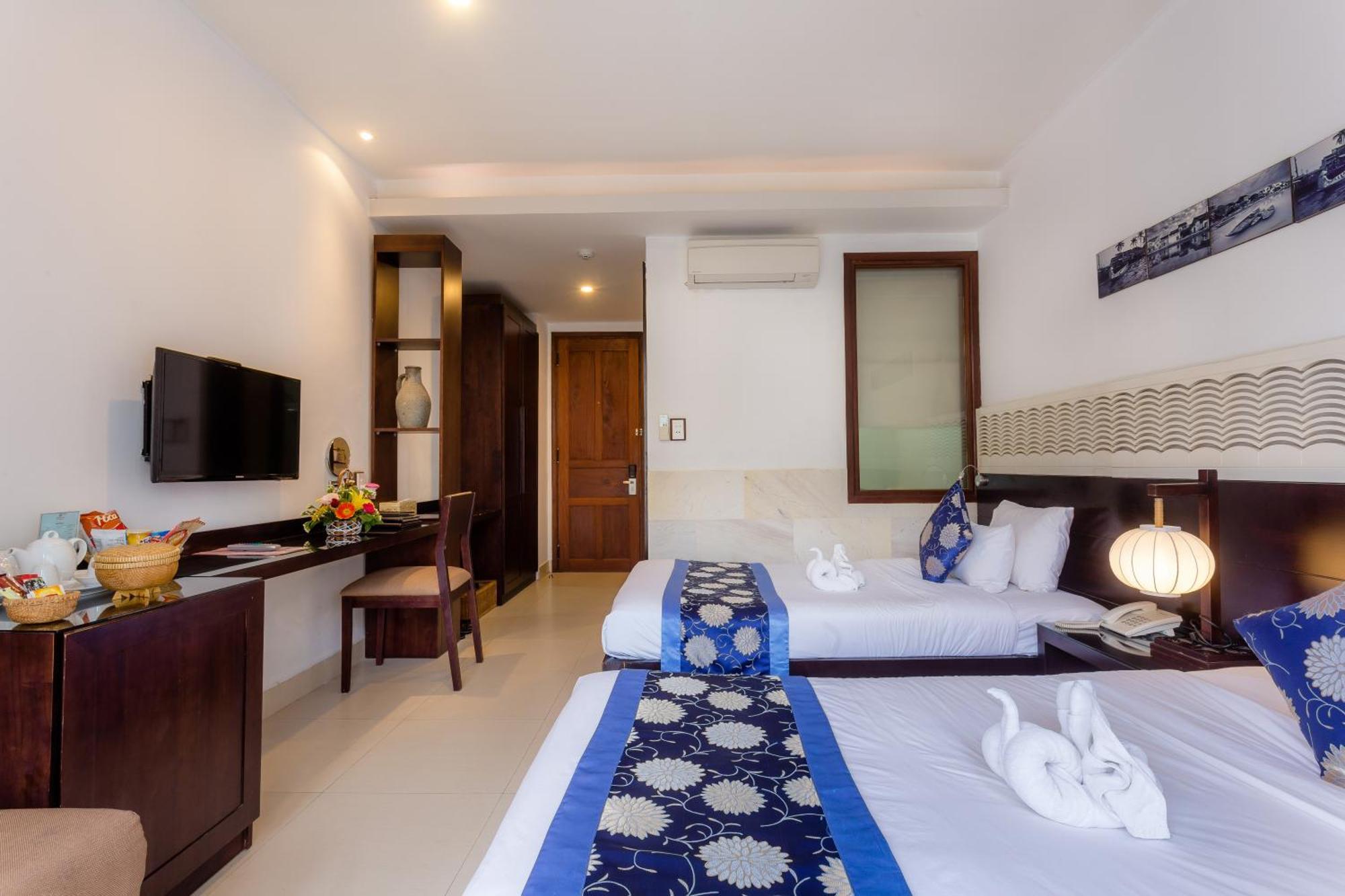 เอเมอรัลด์ ฮอยอัน ริเวอร์ไซด์ รีสอร์ต Hotel ภายนอก รูปภาพ